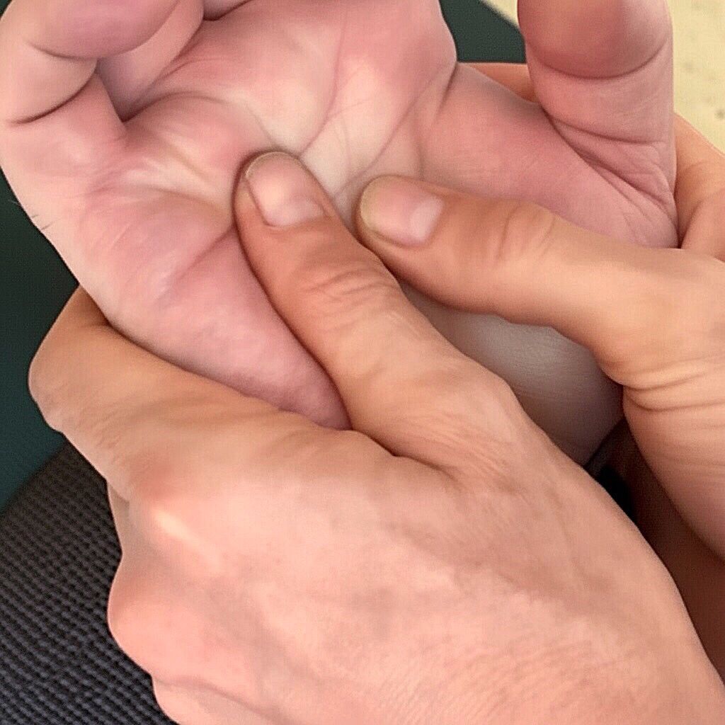 Angela practicing Reiki healing